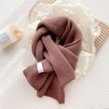 Thick knitted winter scarf in brick red color featuring a minimalist brand woven label - Dusty Pink