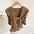Deep brown knitted shawl with knot design and cable pattern on a wooden hanger - Camel