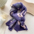 Purple knit scarf featuring floral jacquard patterns and ribbed edges in a stylish fold - Big Flower Purple
