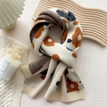 Thick knitted scarf featuring abstract floral patterns in beige, orange, and grey tones - Big Floral Beige