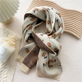 Beige knit scarf with orange floral pattern and ribbed edges for a cozy winter style - Flower Branch Beige
