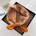 Vibrant orange mulberry silk square scarf with geometric patterns in a luxury gift box - Alphabet Elephant Orange Base