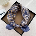 Navy blue mulberry silk scarf with gold geometric pattern presented in a gift box - Alphabet Elephant Blue Base