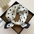 Elegant silk square scarf featuring classic black polka dots on cream white fabric - Frame Polka Dot Beige