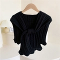 Knitted black shawl wrap with scalloped edges and textured ribbing on wooden hanger - Black
