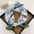 Silk square scarf with navy geometric lines and green accents in a brown gift box - Green Four Graphics (16Z)