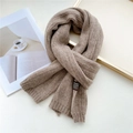 Solid coffee brown knitted scarf with ribbed texture and black woven label on warm background - Coffee (Brown Label)