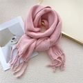 Thick pink knit scarf with decorative tassels and a soft textured finish for winter - Pink