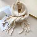 Cream knit scarf with soft tassels and cozy thick texture in a warm minimalist style - Cream