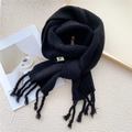 Solid black knit scarf with fringe details and vertical ribbed texture for winter - Black