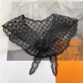 Detailed macro view of black lace triangular scarf with diamond embroidery and wave edges - 18*100cm / Black