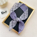 Narrow silk scarf with vintage anchor and purple star patterns tied as a decorative bow - Rope Anchor Purple