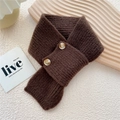 Deep brown ribbed knit neck warmer with amber-style buttons on white textured background - Brown