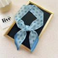 Narrow light blue silk scarf with dark blue diamond patterns and striped edges - Cyan Diamond Hourglass