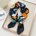 Silk-like square scarf with abstract geometric art print in a luxury display tray - 21 Black CHE Letter