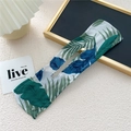 Macro detail of tropical leaf print deft bun maker hair accessory with flexible inner wire - Green Leaf