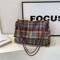 Classic colorful plaid tote bag with silver chain strap and metal logo accent - Red Grid