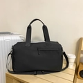 Schwarze Reisetasche aus Oxford-Gewebe mit verstellbarem Schultergurt und großem Volumen - Schwarz