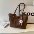 Brown faux leather tote bag with white contrast stitching and plush monster charm - Coffee With Charms