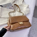 Vintage brown quilted crossbody bag with gold chain strap and rectangular metal lock - Dark Khaki