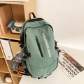 Morandi grüner wasserdichter Nylon-Rucksack mit Seitentaschen und Puppen-Anhänger - Grün mit Anhänger