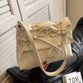 Borsa tote bianco crema in ecopelle con fiocchi e elegante design a pieghe - Bianco Sporco