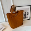 Caramel large capacity canvas tote bag with DOUGU logo and spacious front pocket - Brown