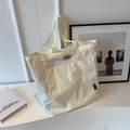 Large off-white tote bag in lightweight textured nylon with a minimalist brand label - Off White