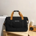Grande borsa da viaggio in tessuto Oxford nero con manici arancioni e scomparto scarpe - Nero