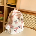 Witte gewatteerde rugzak met roze berenprints en een pluizige witte pompon hanger - Roze Met Hanger