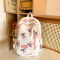 Quilted white backpack featuring pink bear patterns and adjustable straps for women - Pink