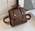 Vintage brown leather backpack with gold fashion buckles and dual carrying handles - No Pendant / Brown