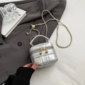 Silver quilted mini bucket bag with metallic leather and elegant gold chain strap - Small / Silver
