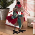 Close-up of bird ornament with plaid hat and faux fur trim on wooden surface - Checkered Hat Bird