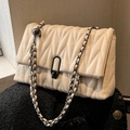 Chic cream quilted leather shoulder bag with V-pattern stitching and metallic chain - White