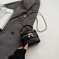 Chic black quilted bucket bag with gold chain strap and adjustable metal ball accessory - Small / Black