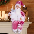 Rosa Samt-Weihnachtsmann-Figur mit silbernem Geschenksack und Laterne auf Kamin - Sitzender Weihnachtsmann Rosa Samt Stil