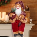 Detail of 12-inch sitting Santa Claus doll with lantern and gift bag on fireplace - Sitting Santa with Lantern Red Gold Plaid