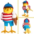 Detail of yellow bird figurine wearing summer hat and striped shirt with ice cream - Ice Cream Bird