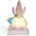 Pink glowing Easter gnome with sequin hat holding a blue egg ornament - Pink