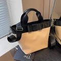 Borsa a secchiello donna in nylon crema e nero con fiocco decorativo e tracolla regolabile - Cachi