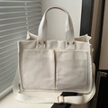 Off-white canvas draagtas met dubbele voorzakken en verstelbare schouderband voor dames - Wit