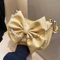 Pale yellow bow shoulder bag with white pearl strap and silver floral chain link - Yellow