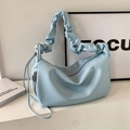 Light blue pleated tote bag with soft leather finish and scrunchie handle for women - Blue