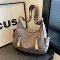 Brown canvas tote bag with front zipper pockets and wide shoulder strap - Gray