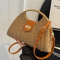 Strohhandtasche in Beige mit braunen Ledergriffen und verstellbarem Schultergurt - Khaki