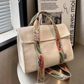 Off-white canvas tote bag with floral embroidered strap and minimalist flap closure - Cream White (Contrast)