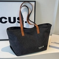 Minimalistische Canvas-Tasche in Dunkelgrau mit braunen Ledergriffen und TELN-Logo - Schwarz