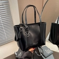 Black leather tote bag with adjustable strap and MOKANI YOLE PARIS logo for women - Black