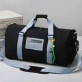 Large capacity black and blue nylon duffel bag with shoulder strap and smile pendant - Black